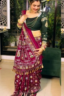 Bandhani Print Patola Saree in Vichitra Silk fabric in maroon color