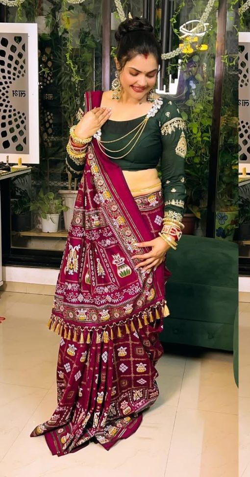 Bandhani Print Patola Saree in Vichitra Silk fabric in maroon color