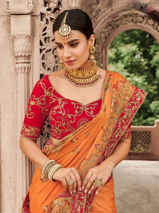 Orange red deals wedding saree