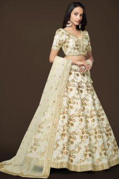 Alternative view of graceful white color lehenga made of slub silk material embellished with dori work, zari sequin work, and embroidery work
