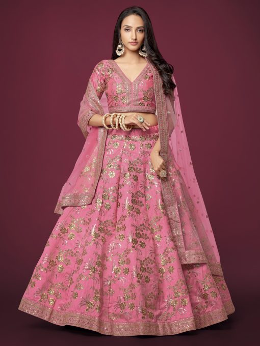 beautiful pink color lehenga made of slub silk material embellished with dori work, zari sequin work, and embroidery work