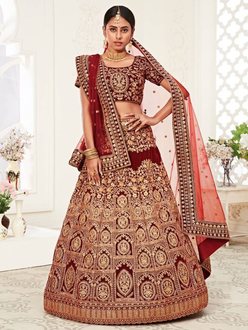 traditional lehenga in velvet material heavily embellishes with thread, zari, dori, and sequin embroidery work