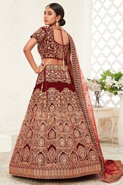 Alternative view of traditional lehenga in velvet material heavily embellishes with thread, zari, dori, and sequin embroidery work