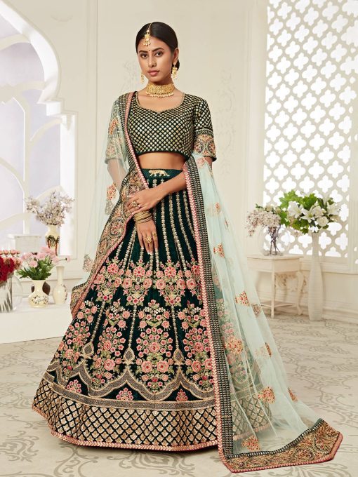 Lehenga in Dark Green Velvet richly crafted with Dori, Zari & Thread embroidery with Diamond work