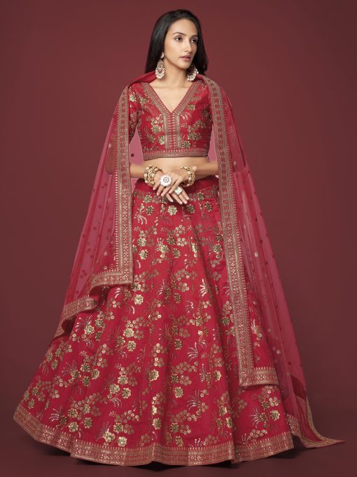 red color lehenga made of slub silk material decorated with dori work, zari sequin work, and embroidery work