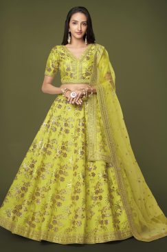 lehenga made of slub silk material decorated with dori work, zari sequin work, and embroidery work